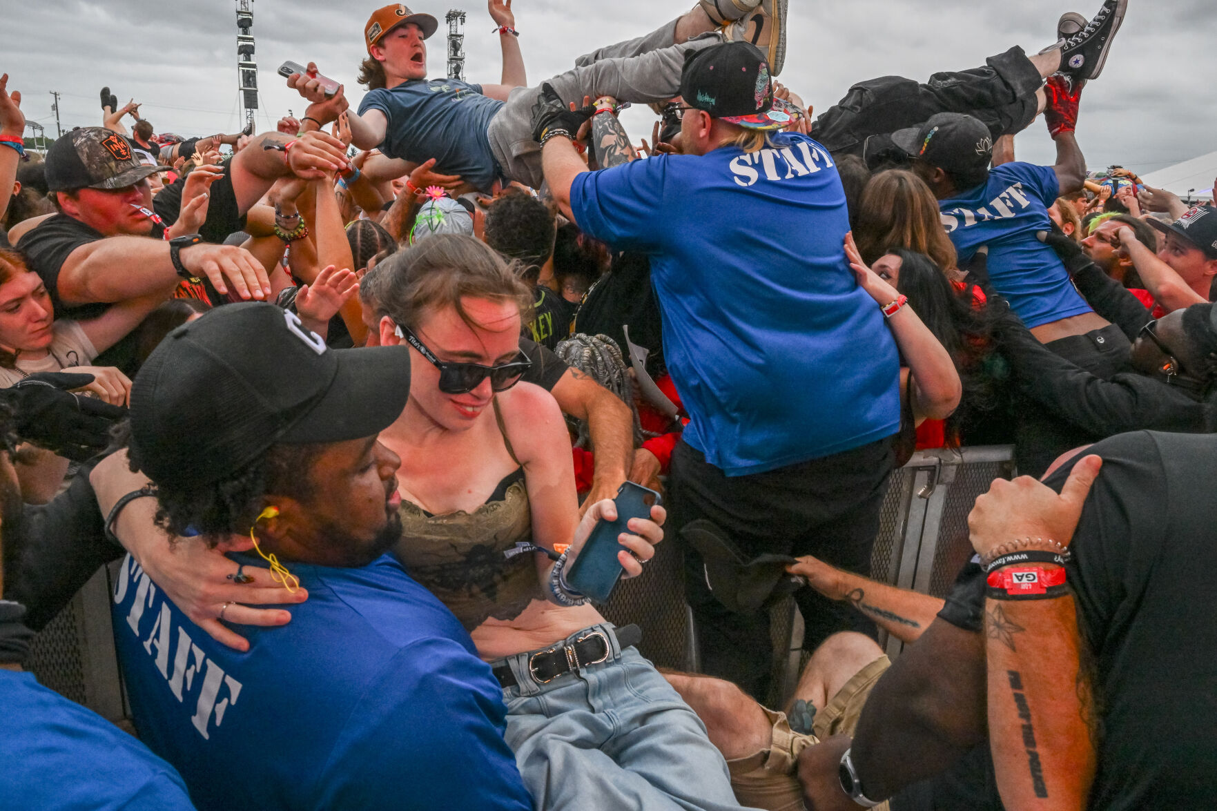 Louder Than Life 2024 staff help crowd surfers